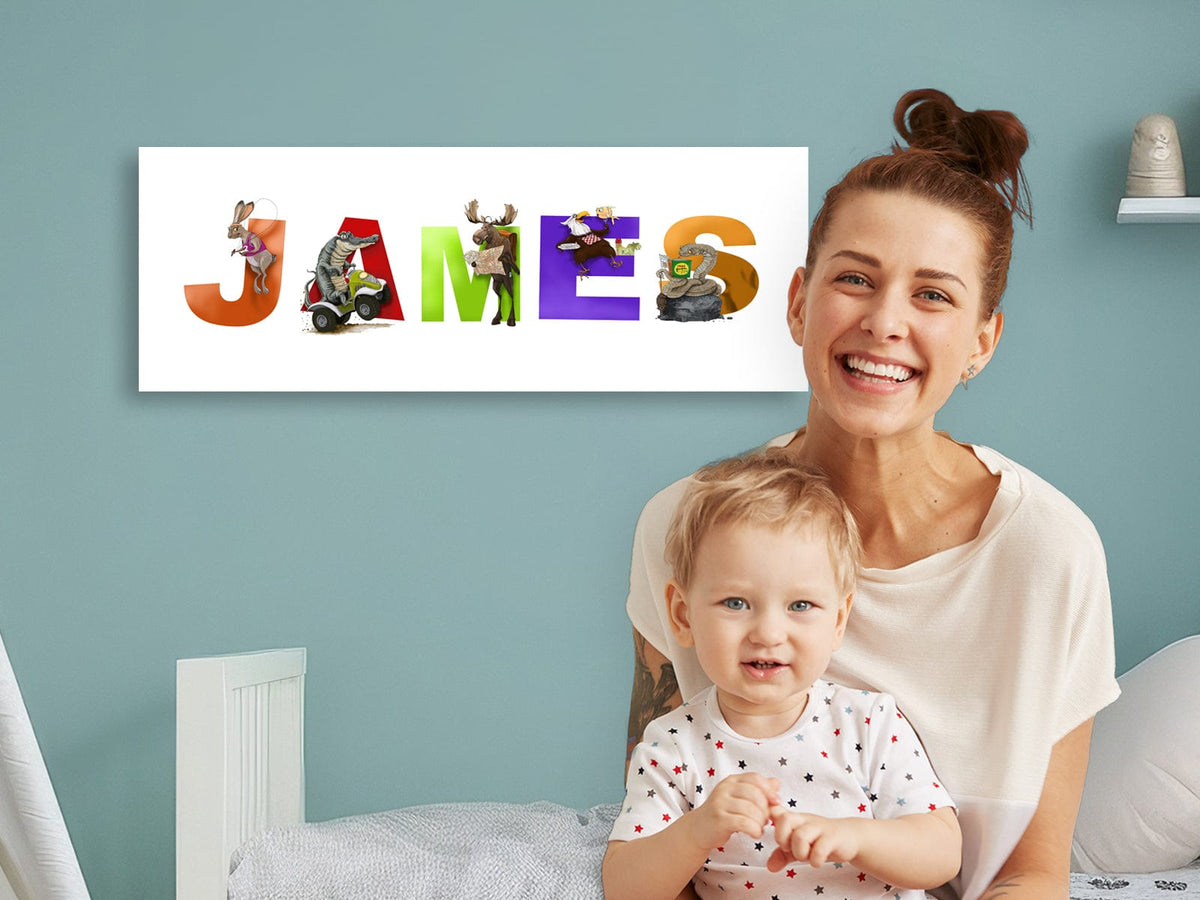 Mom and child sitting in front of kid&#39;s animal name art 