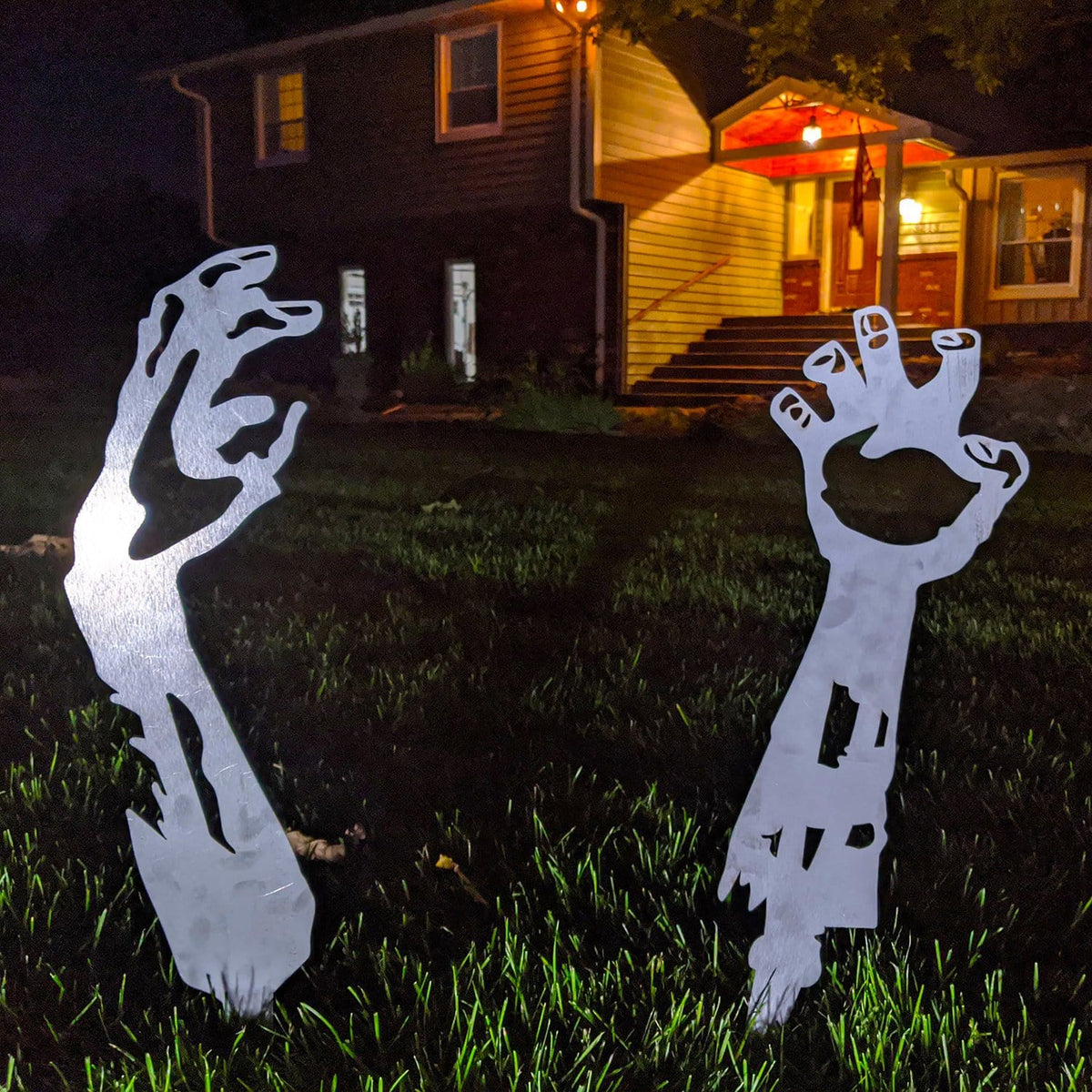 Zombie arms coming out of ground metal yard decor for Halloween