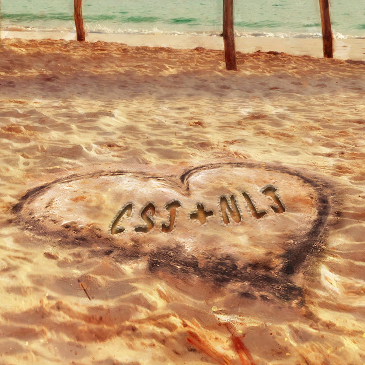 detail of personalization names in heart in sand
