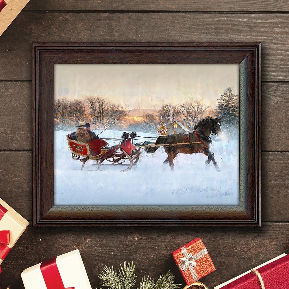 Framed One Horse Open Sleigh christmas art print next to gifts and garland on a rustic backdrop
