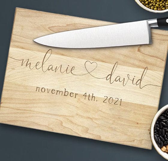 Personalized wood cutting board with names, date and heart